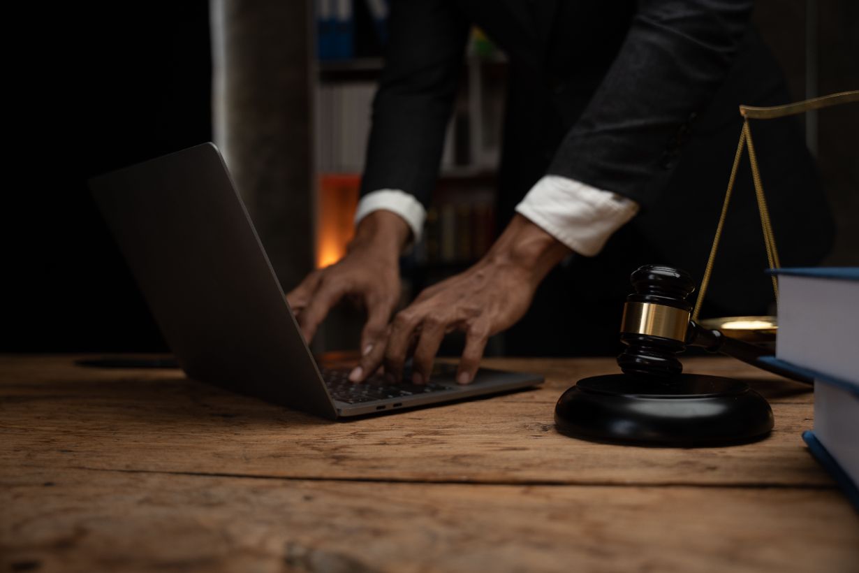 Criminal Defense Attorney Reviewing Ai Search Strategy On Laptop