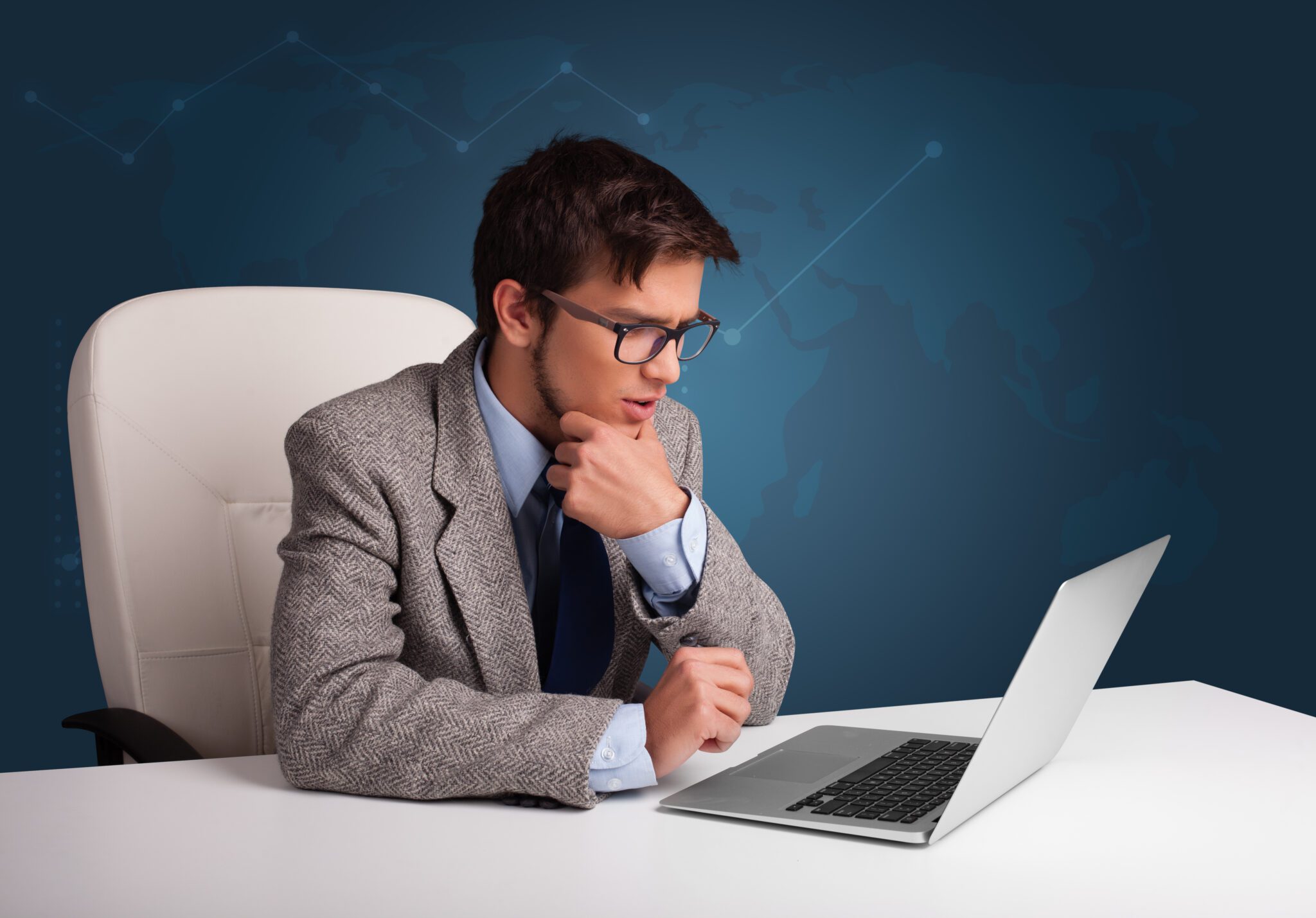 Attractive Young Man Sitting At Desk And Typing On 2025 10 13 09 08 21 Utc 2048x1429 1